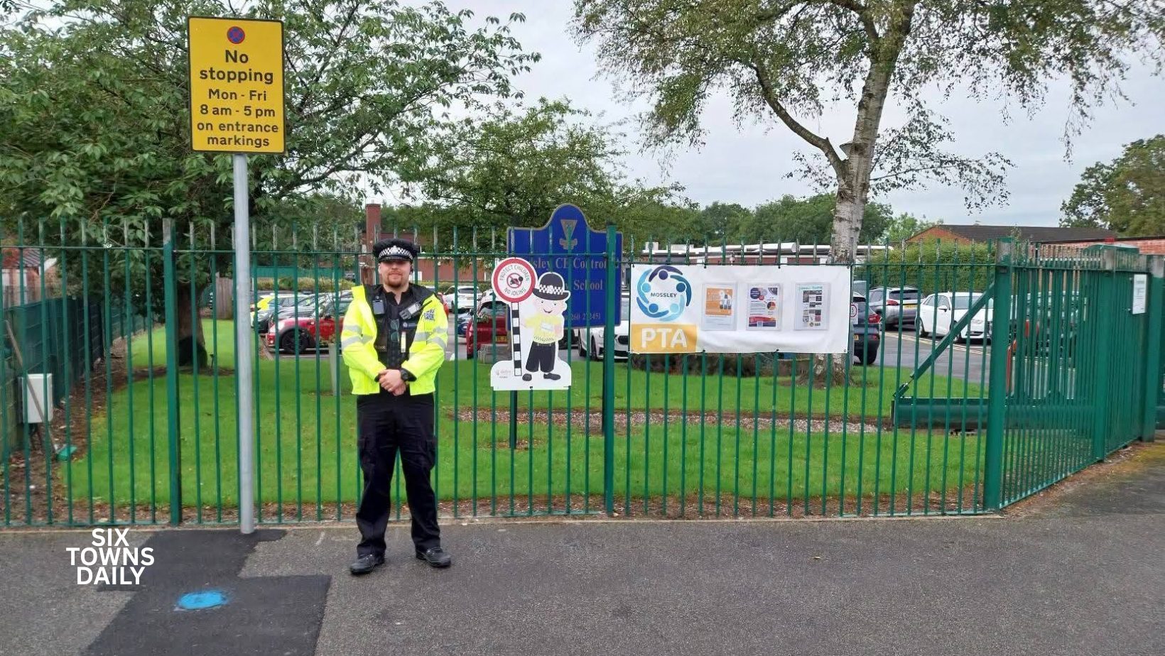 Police standing guard outside school
