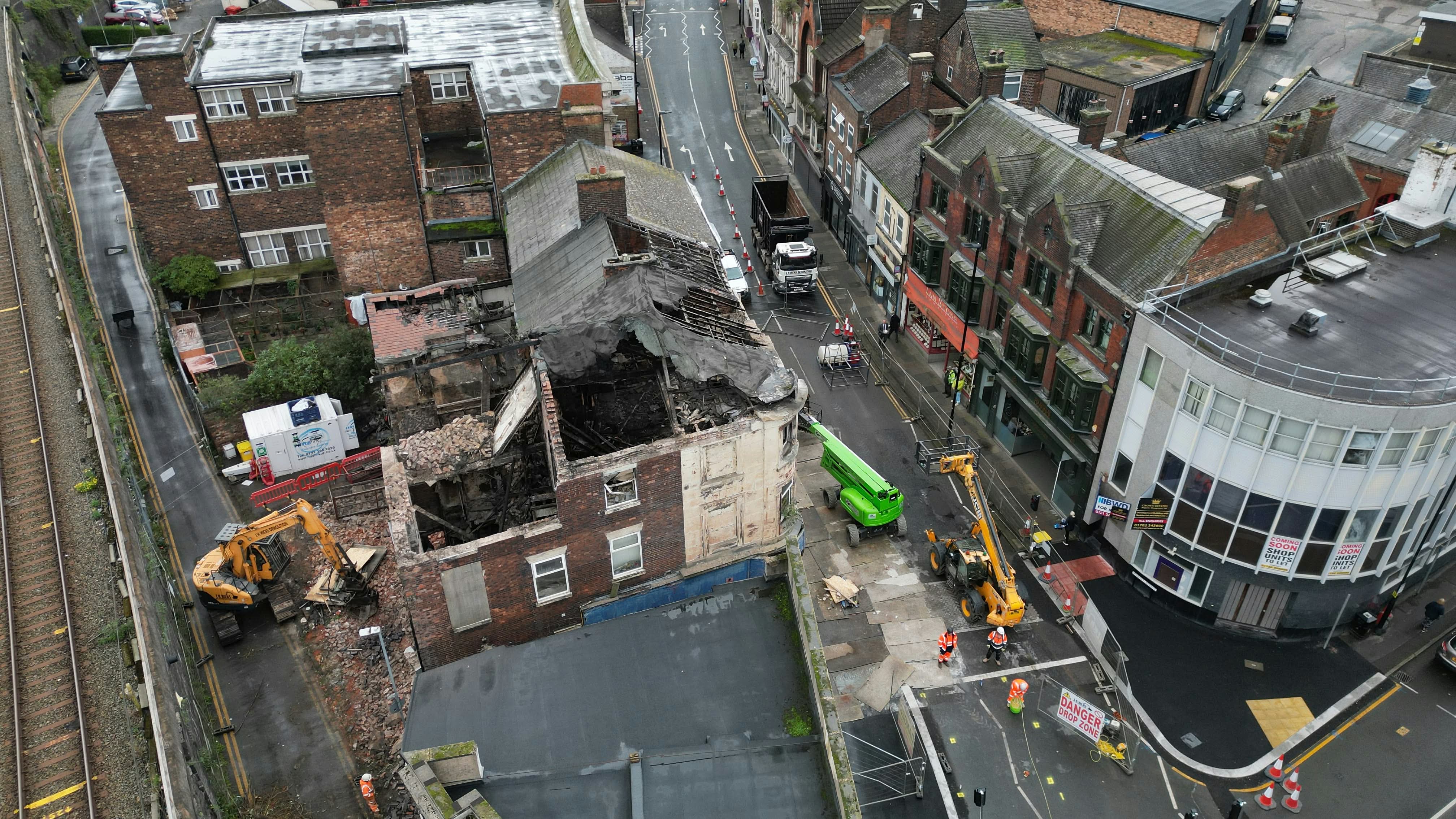 Aerial view of the fire-damaged building in Market Street, Longton, during demolition.