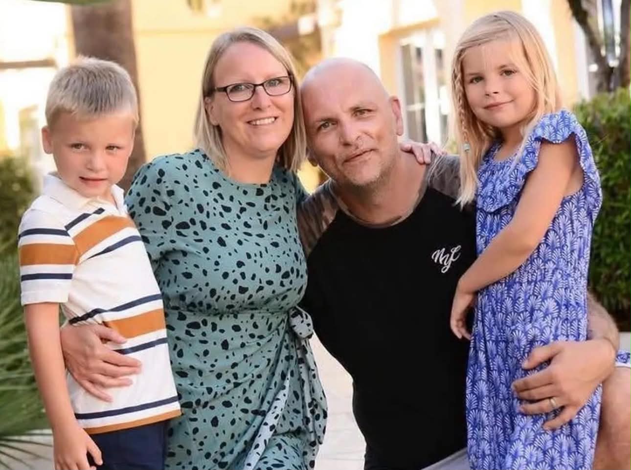 Alana and Aidan with their mum and dad, Craig.