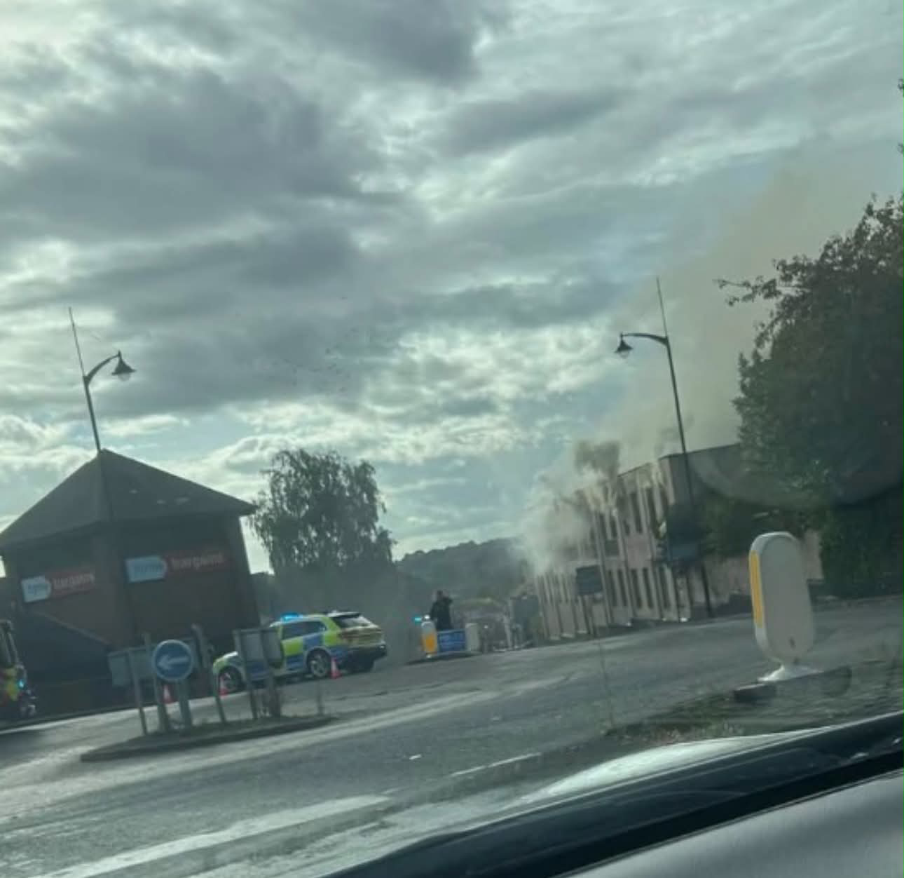 Smoke Pours From Building As Fire Breaks Out On Newcastle Street, Burslem, With Police Diverting Traffic